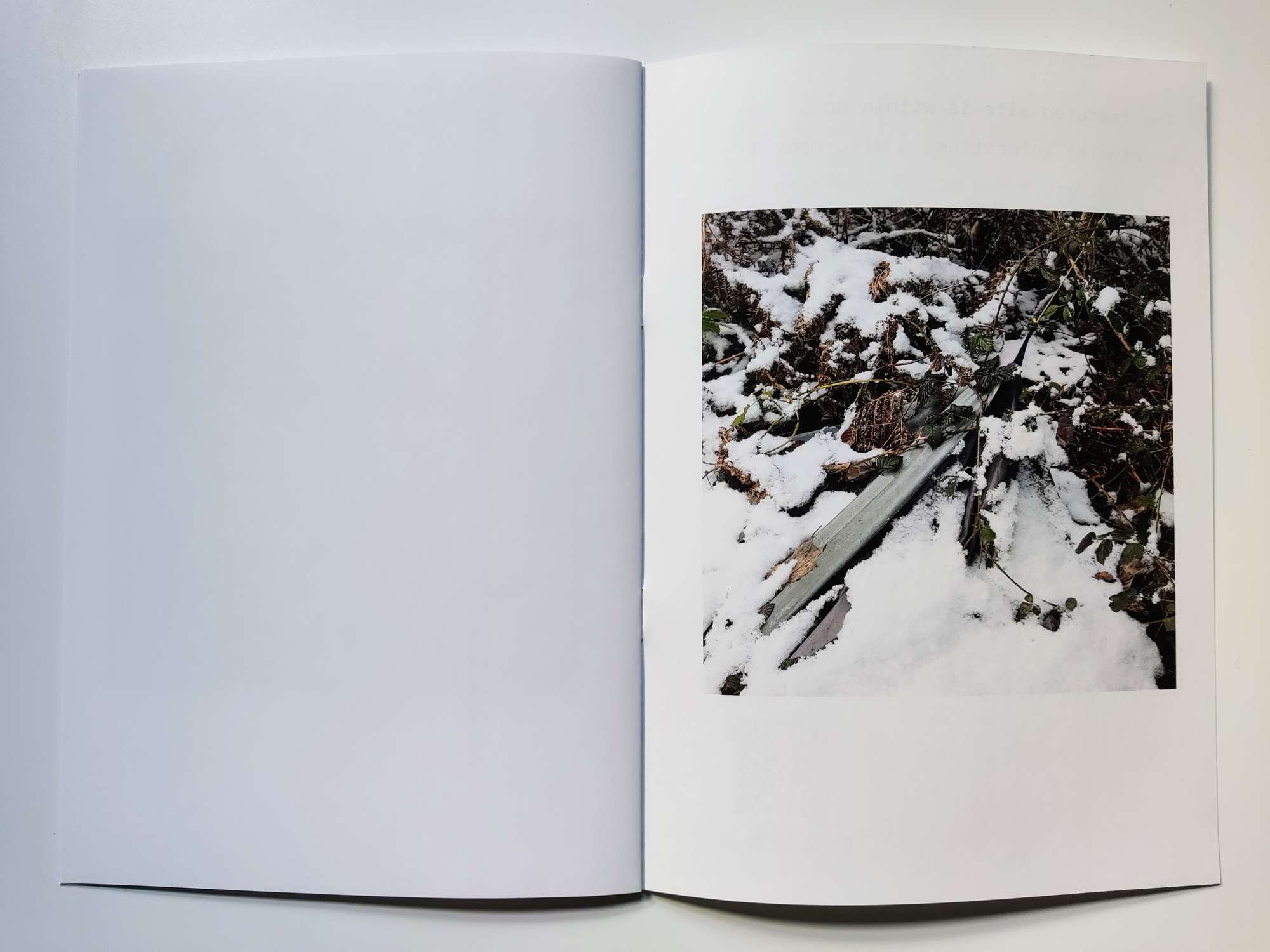 Zine/photobook. Snow covers the tent.